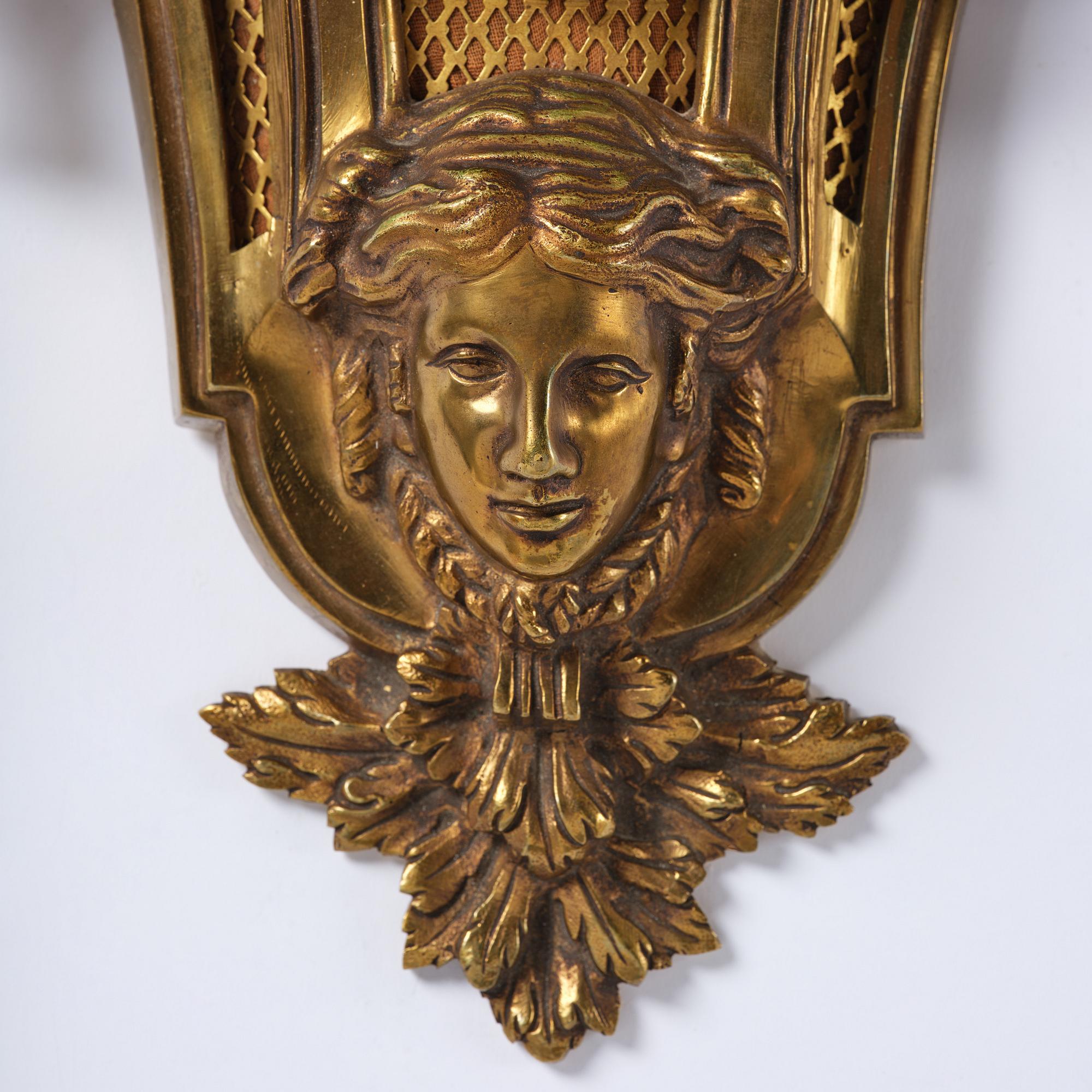 A French  Louis XVI-style wall clock, around 1900.