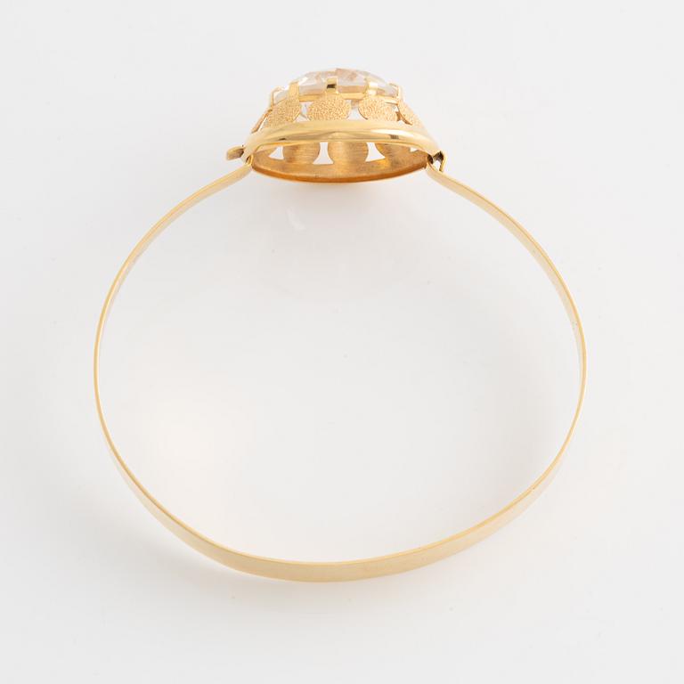 Armring och ring, 18K guld med bergkristall.