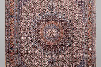 A carpet, Moud, signed, ca 385 x 268 cm.