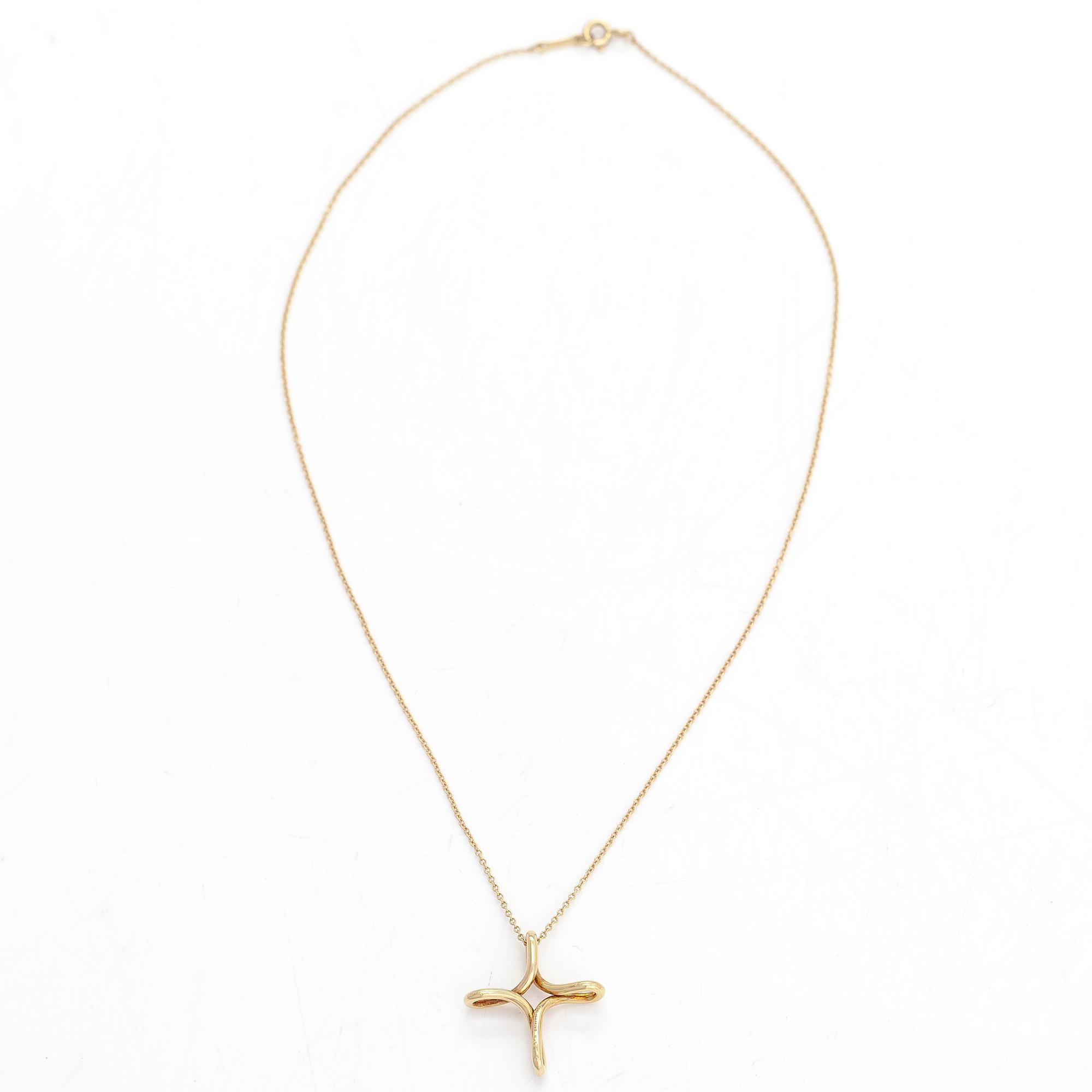 Tiffany & Co, Elsa Peretti, halsband, "Infinity Cross", 18K guld.