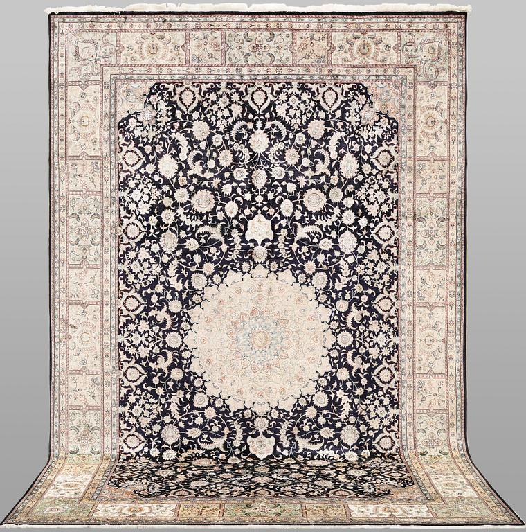 An oriental silk carpet, c. 283 x 184 cm.