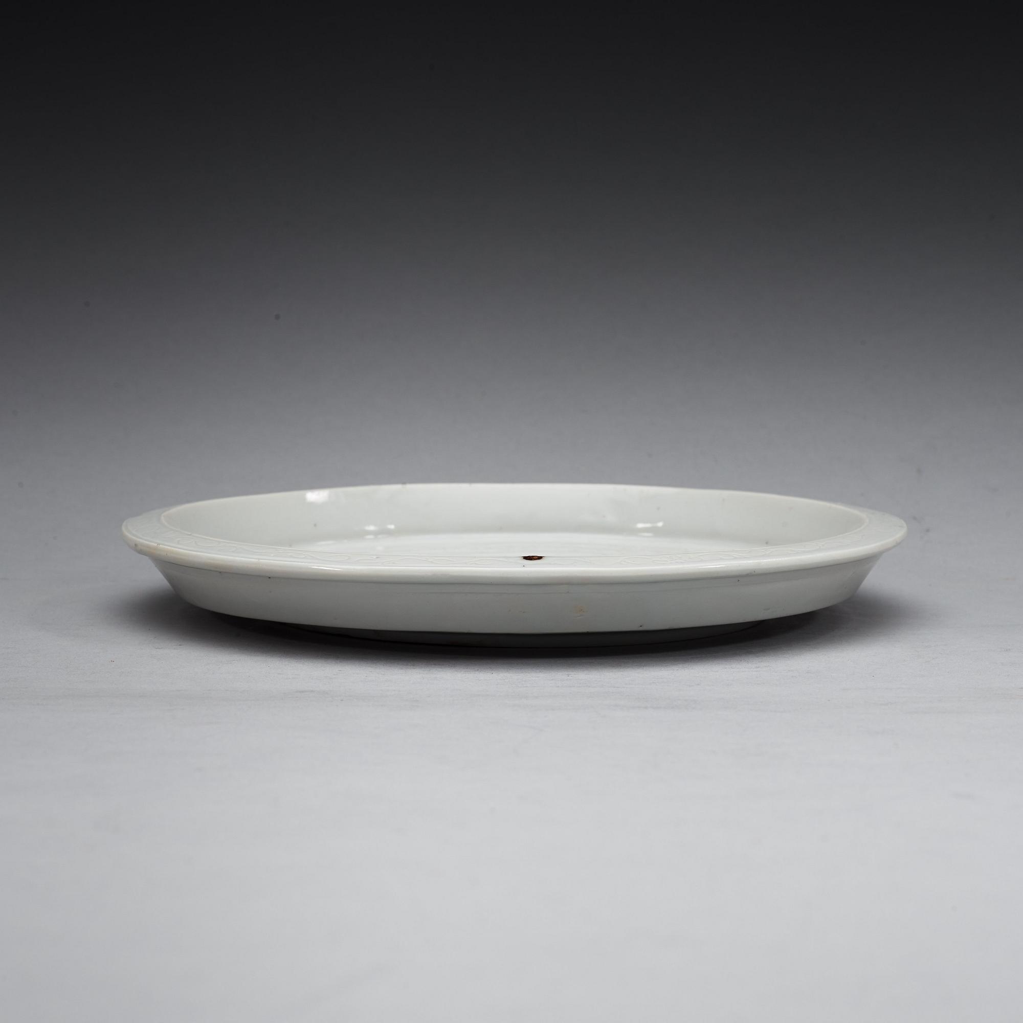 A blanc de chine tray, 18th Century or older.