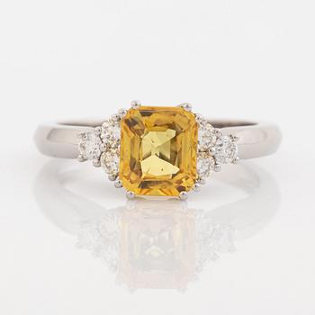 Yellow sapphire and diamond ring.
