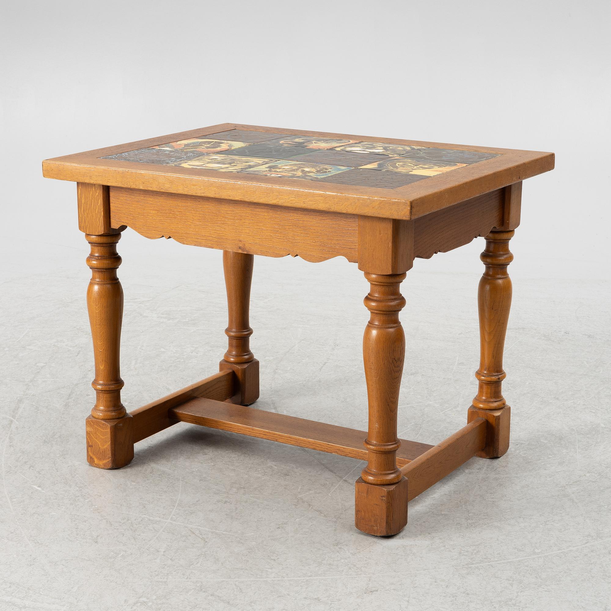Allan Ebeling, table with various ceramic tiles, Torshälla, mid 1900s.