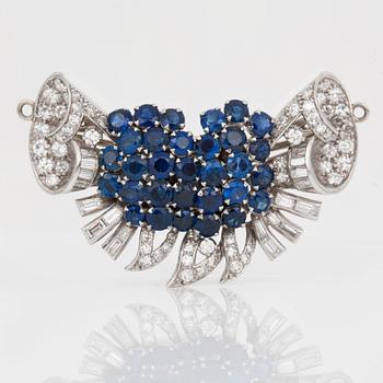 A diamond and sapphire set, probably Garrard & co. The set can be worn as a necklace, earrings, double clip or brooch.