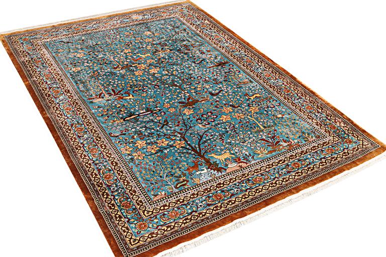 An all silk oriental carpet, a. 280 x 185 cm.