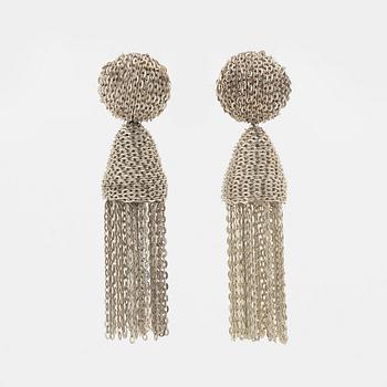 Oscar De La Renta, a pair of clip-on silver chain tassel earrings.