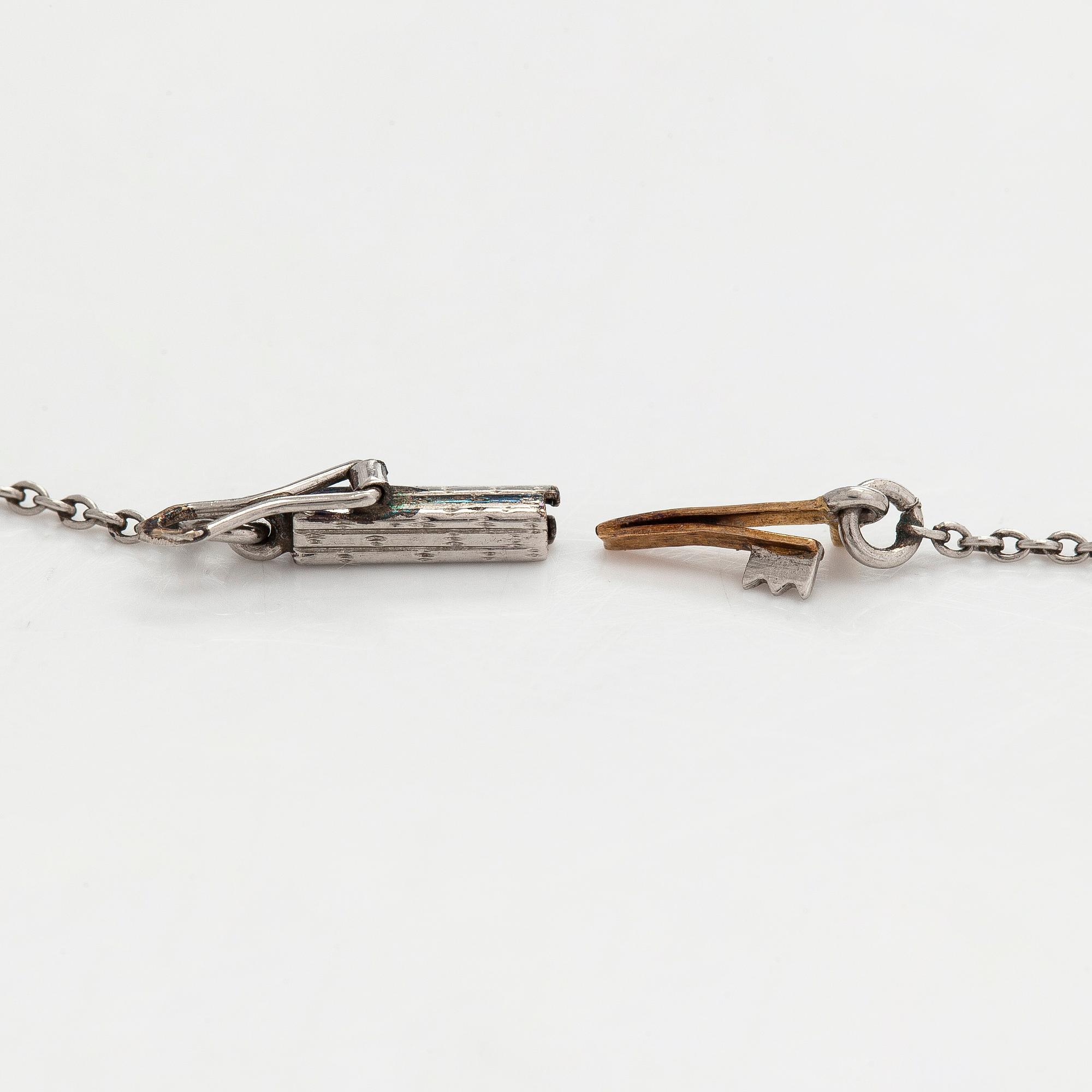 A platinum/17K gold necklace, set with old-cut diamonds, first half of the 20th century.