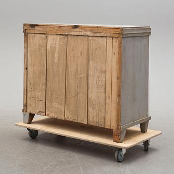A mid 19th century painted chest of drawers.
