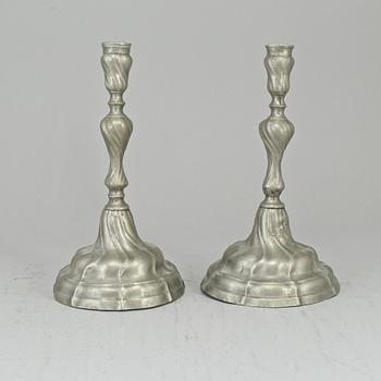 A pair of pewter rococo candlesticks. 18th century.