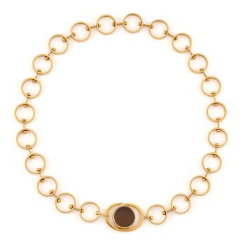 390. Karl-Ingemar Johansson, a necklace 18K gold with smoky quartz, Gothenburg 1963.