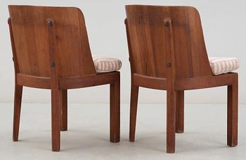 A pair of Axel Einar Hjorth 'Lovö' pine armchairs, Nordiska Kompaniet (NK), 1930's.