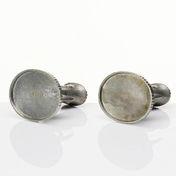 Carl Milles, two pewter candlesticks, Herman Bergman AB, Stockholm 1927 and 1930.