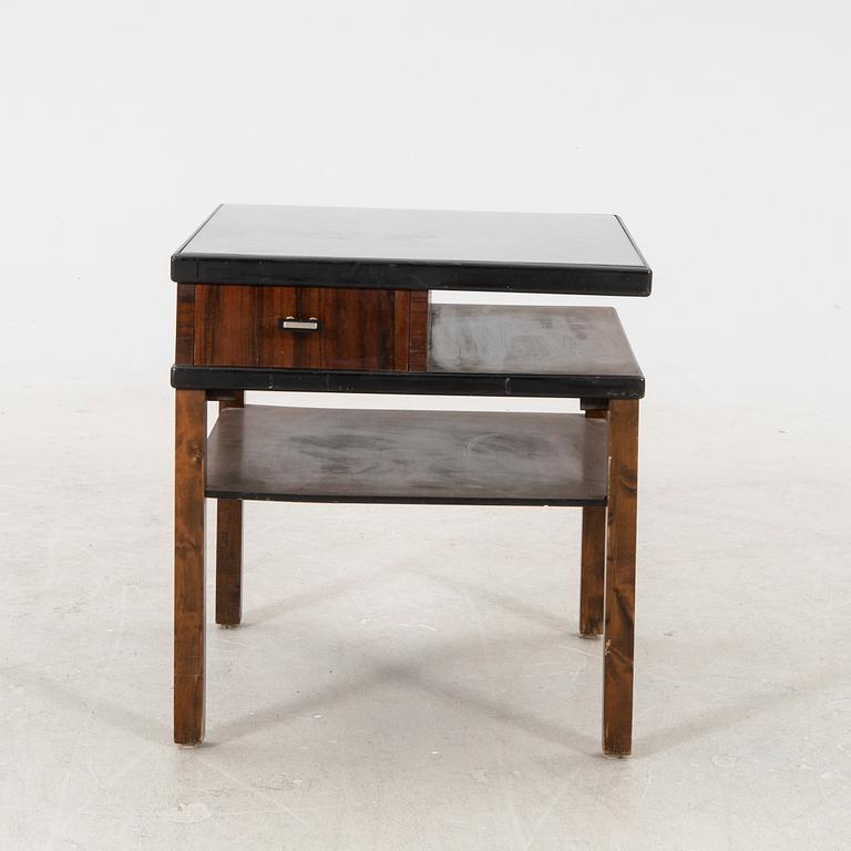 A 1940s birch side table.