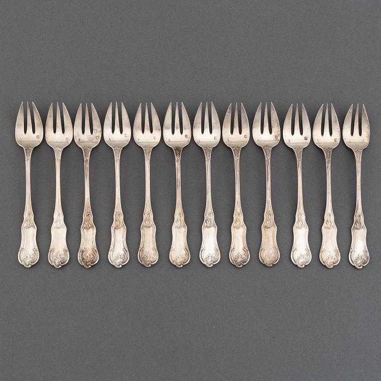 A set of twelve French silver oister-forks, after 1838.