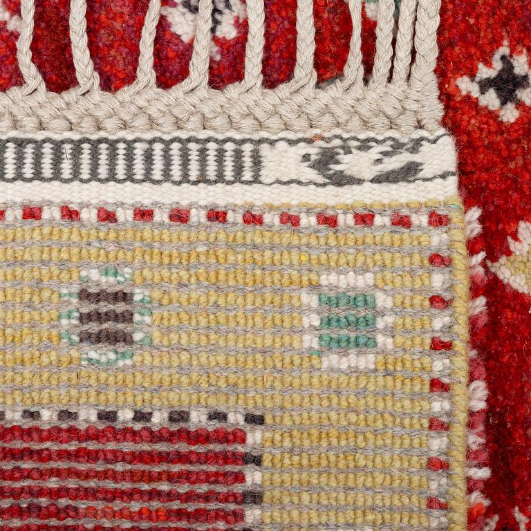 Barbro Nilsson, a 'Rabatten röd' carpet, knotted pile, 266 x 195 cm, signed AB MMF BN.