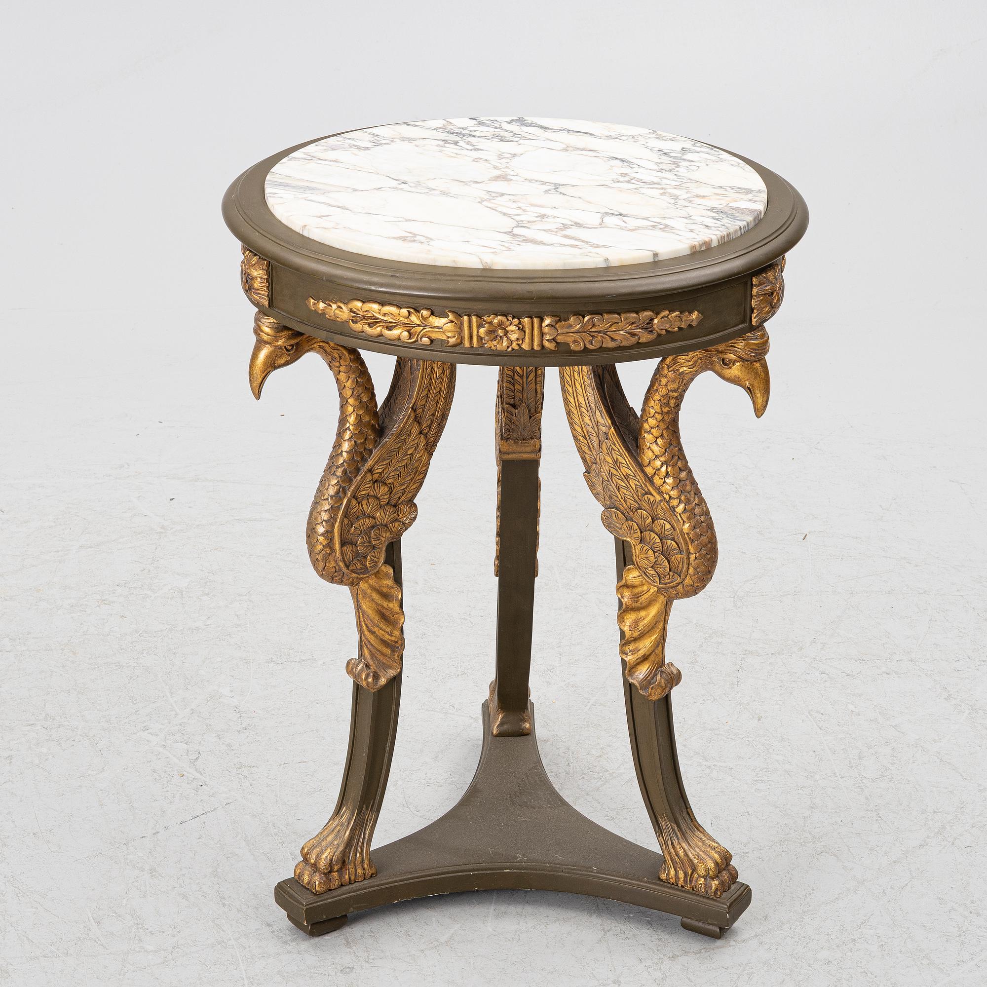 A pair of Empire-style armchairs with an end table, second half of the 20th century.