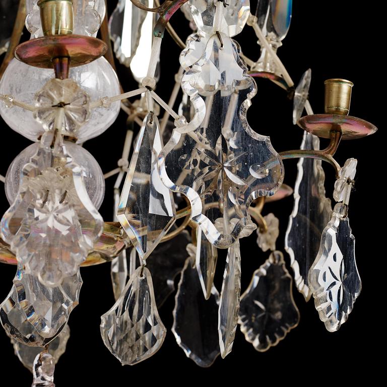 A Swedish rococo gilt-brass and cut glass six-branch chandelier by O. Westerberg (master in Stockholm 1769-1811).