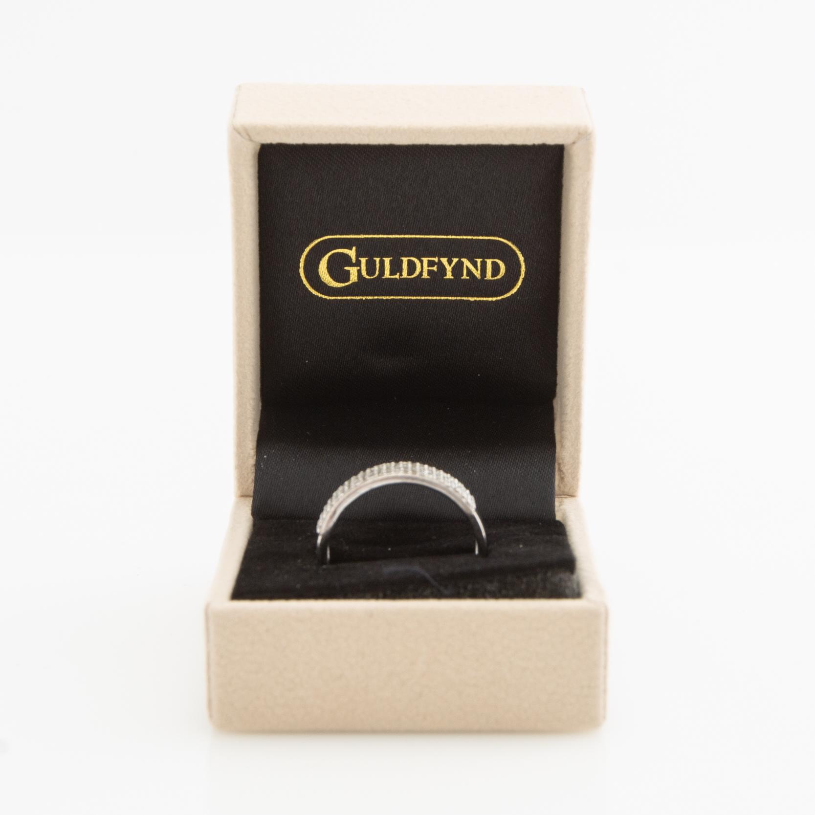 Ring, 18k white gold with octagon-cut diamonds.