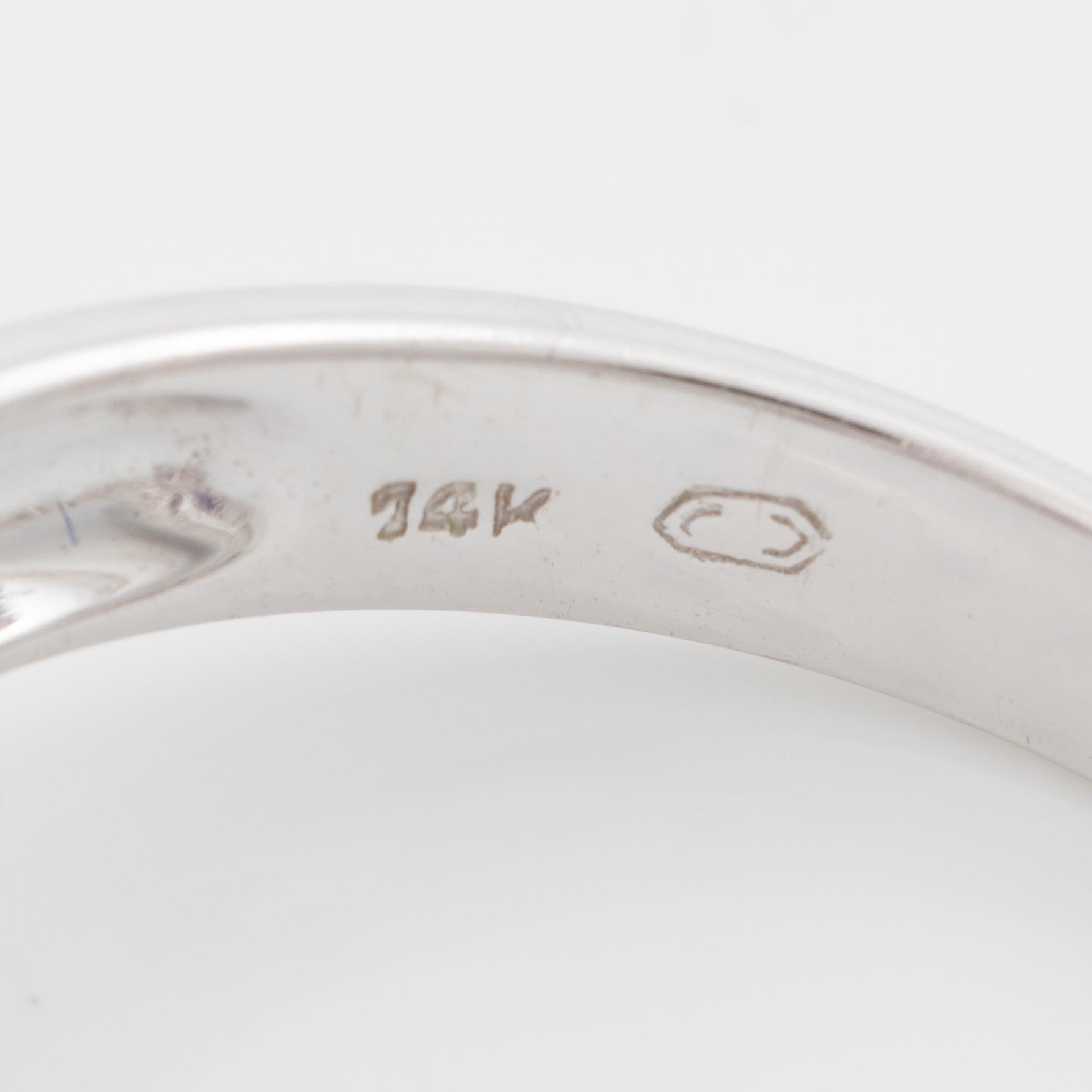 Ring, 14K white gold with amethysts and small diamonds.