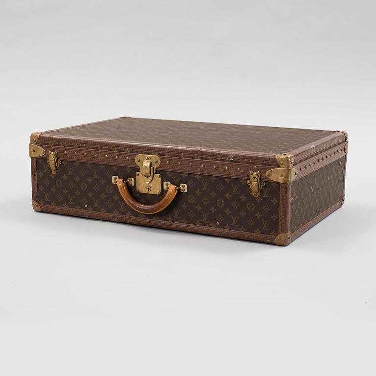 LOUIS VUITTON, a monogram canvas suitcase, "Alzer 75".