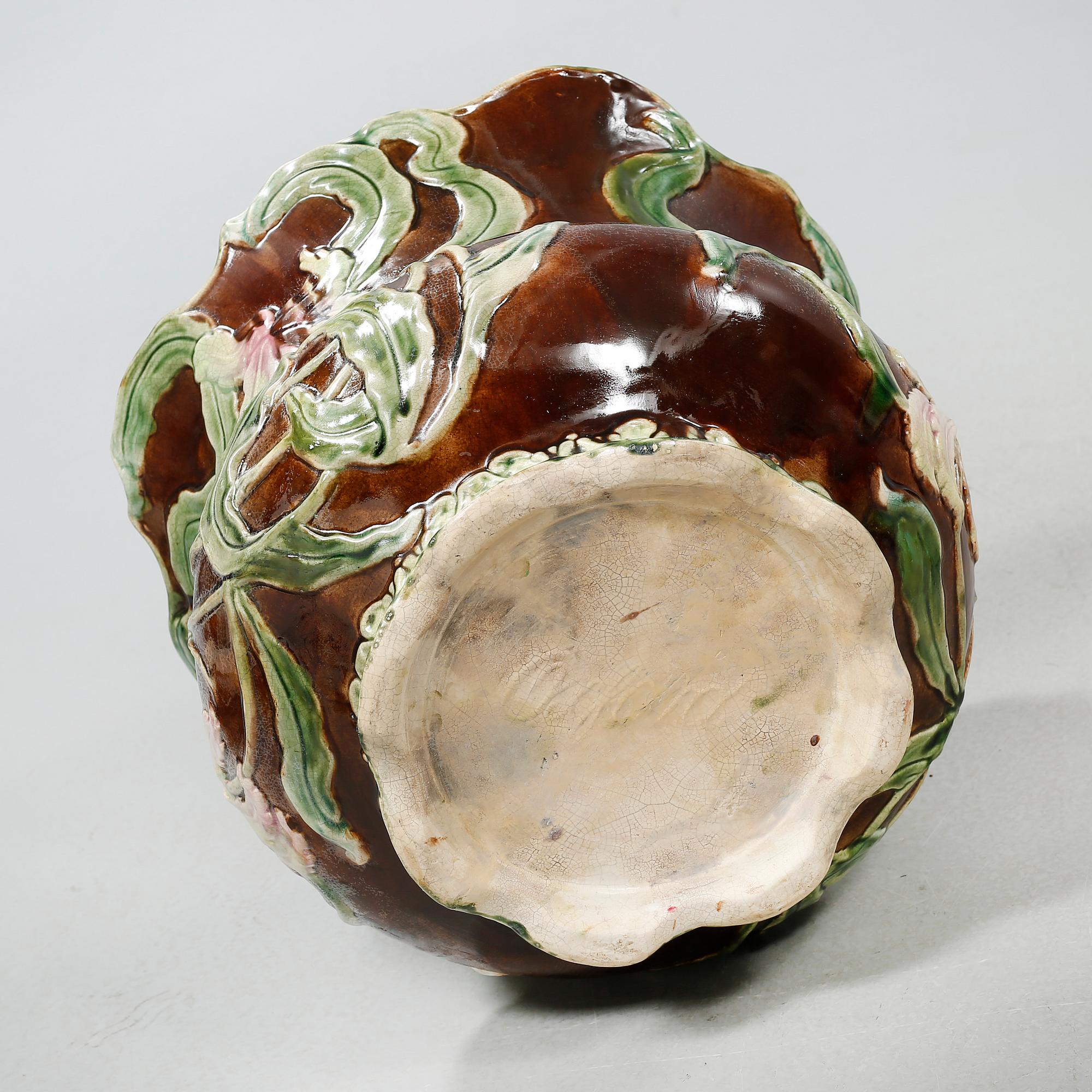 A jugend pedestal with pot in earthenware, urn marked "Oxford", beginning of the 20th century.