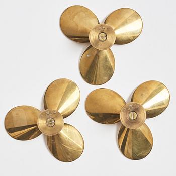 Pierre Forssell, three brass 'Treklövern' candleholders, Skultuna, 1981.