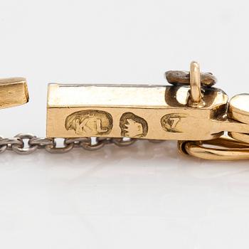 Rannekoru, 18K kultaa timantteja yhteensä noin 0.50 ct. Suomalaiset leimat.