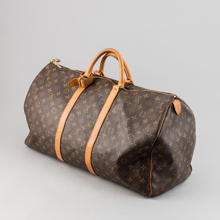 Louis Vuitton, a monogram canvas 'Keepall 55' weekend bag and toilet bag.