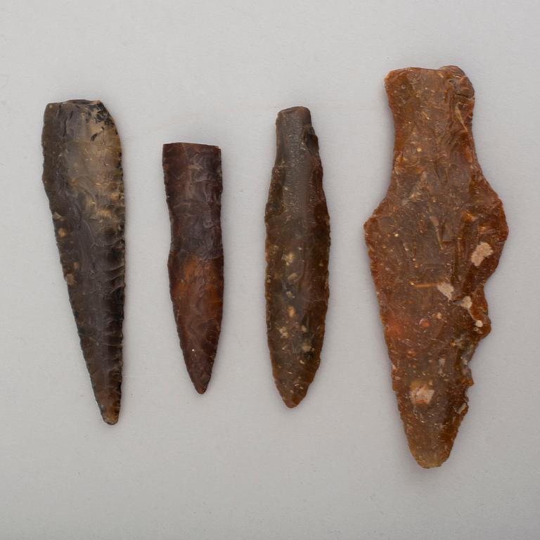 Four neolithic flint points.