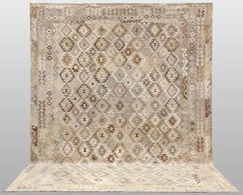 A Kilim carpet, approx. 352 x 252 cm.