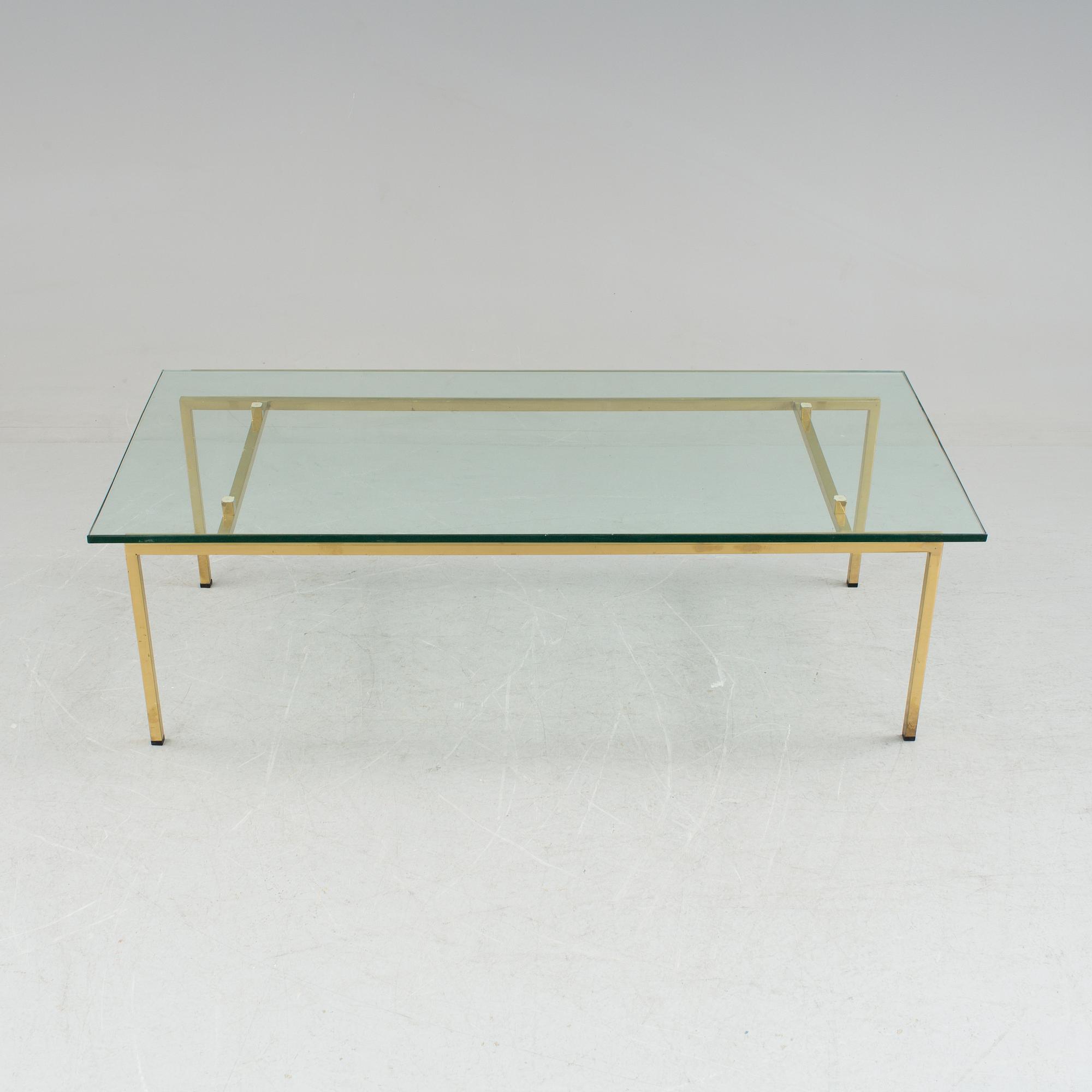 A glass table bought at Svenskt Tenn, 1970's/80's.