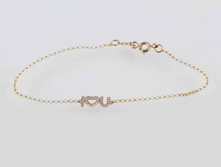 ARMBAND, 18K guld med briljantslipade diamanter ca 0.10 ct. Vikt 1,1 gram.