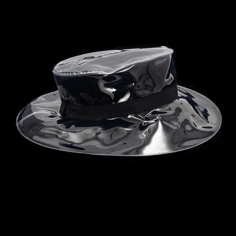 Chanel, a transparent PVC hat, size S.
