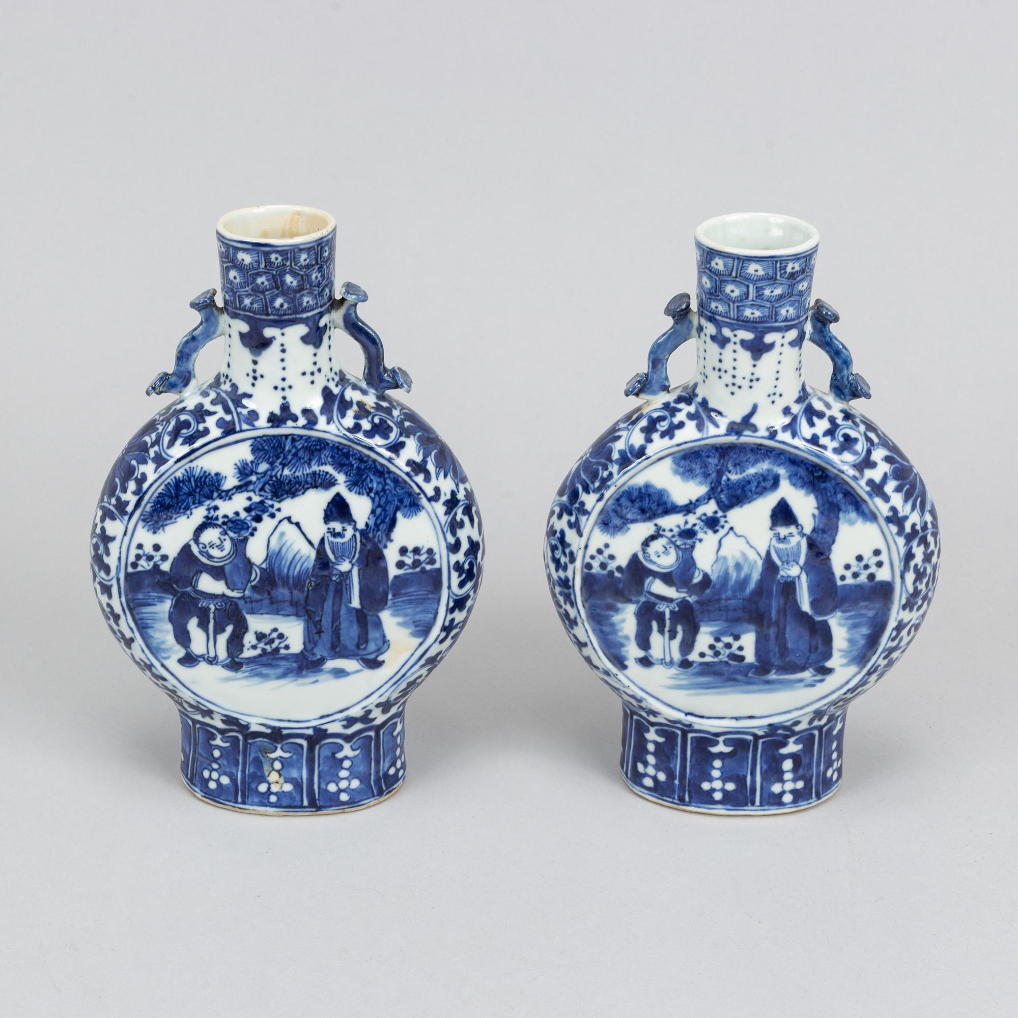 A pair of blue and white moon flasks, Qing dynasty, 19th Century.