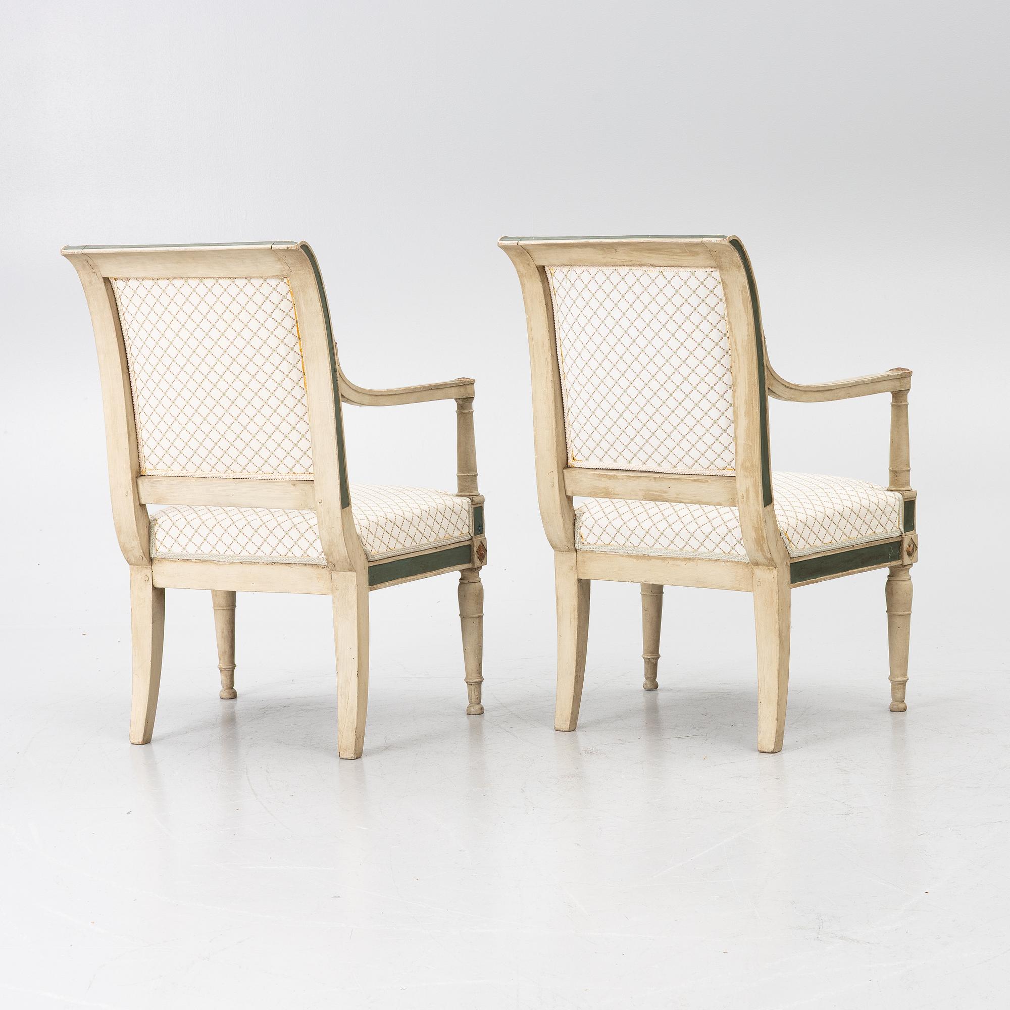 A pair of armchairs, Directoire, France, late 18th Century.