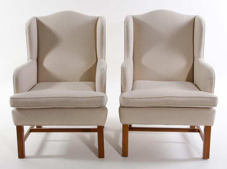 ÖRONLAPPSFÅTÖLJER, ett par. Design Arne Norell för Norell.