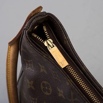 a Louis Vuitton 'Looping GM' bag.