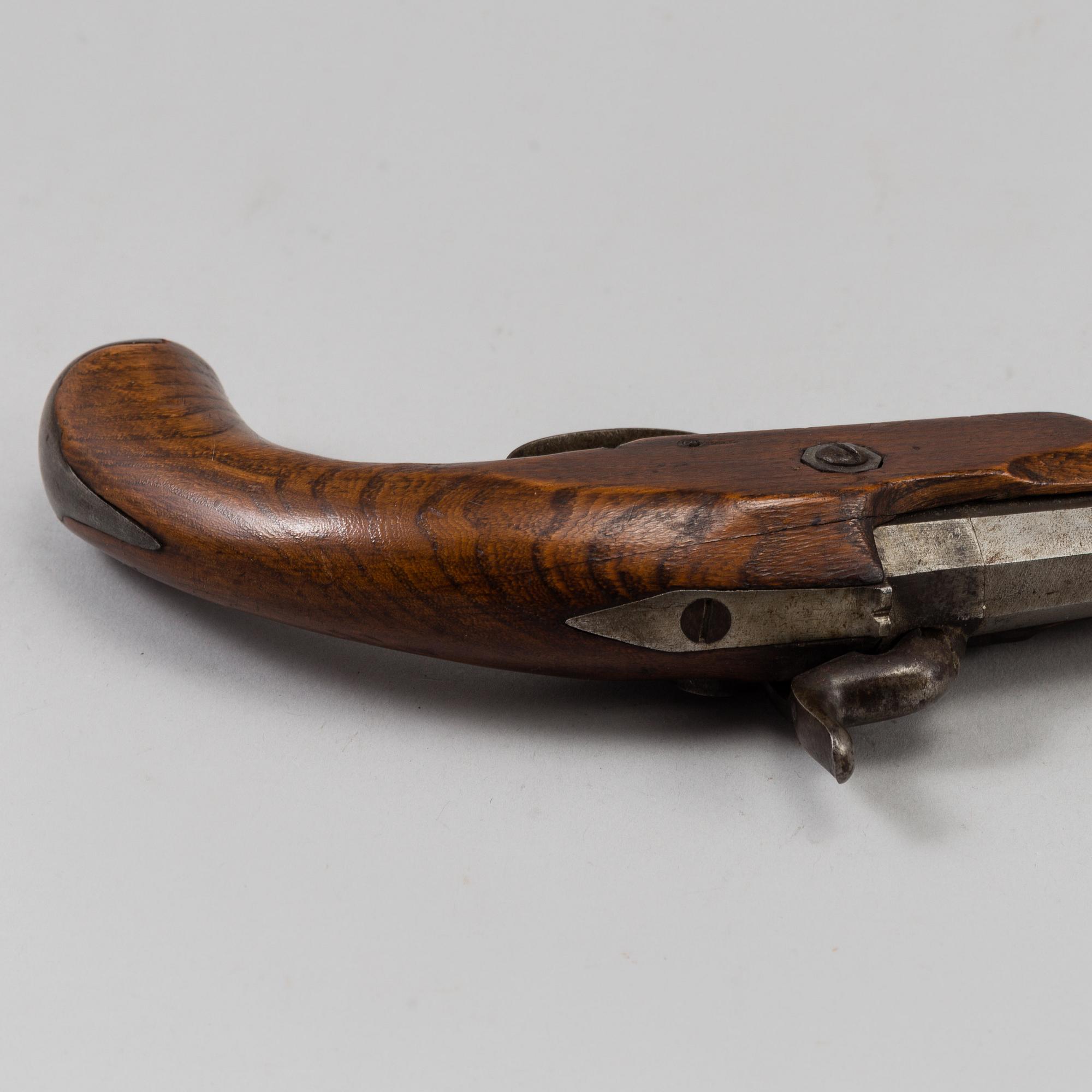 One flint lock postol, late 18th ct, and one percussion pistol, 19th ct.