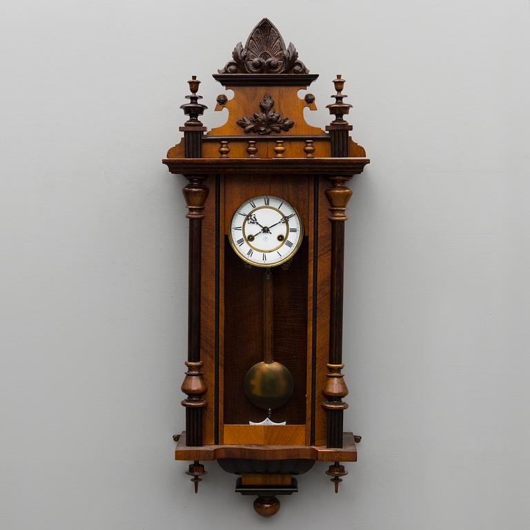 A neo renaissance German Junghans wall clock from around the turn of the 20th Century.