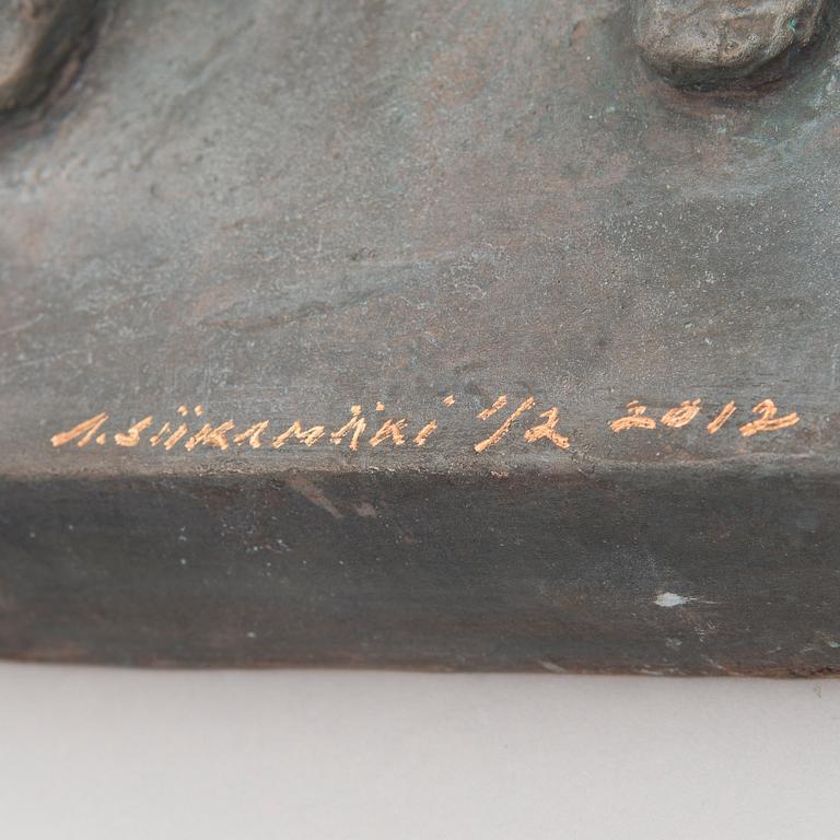 A bronze sculpture signed 1/2 and dated 2012.