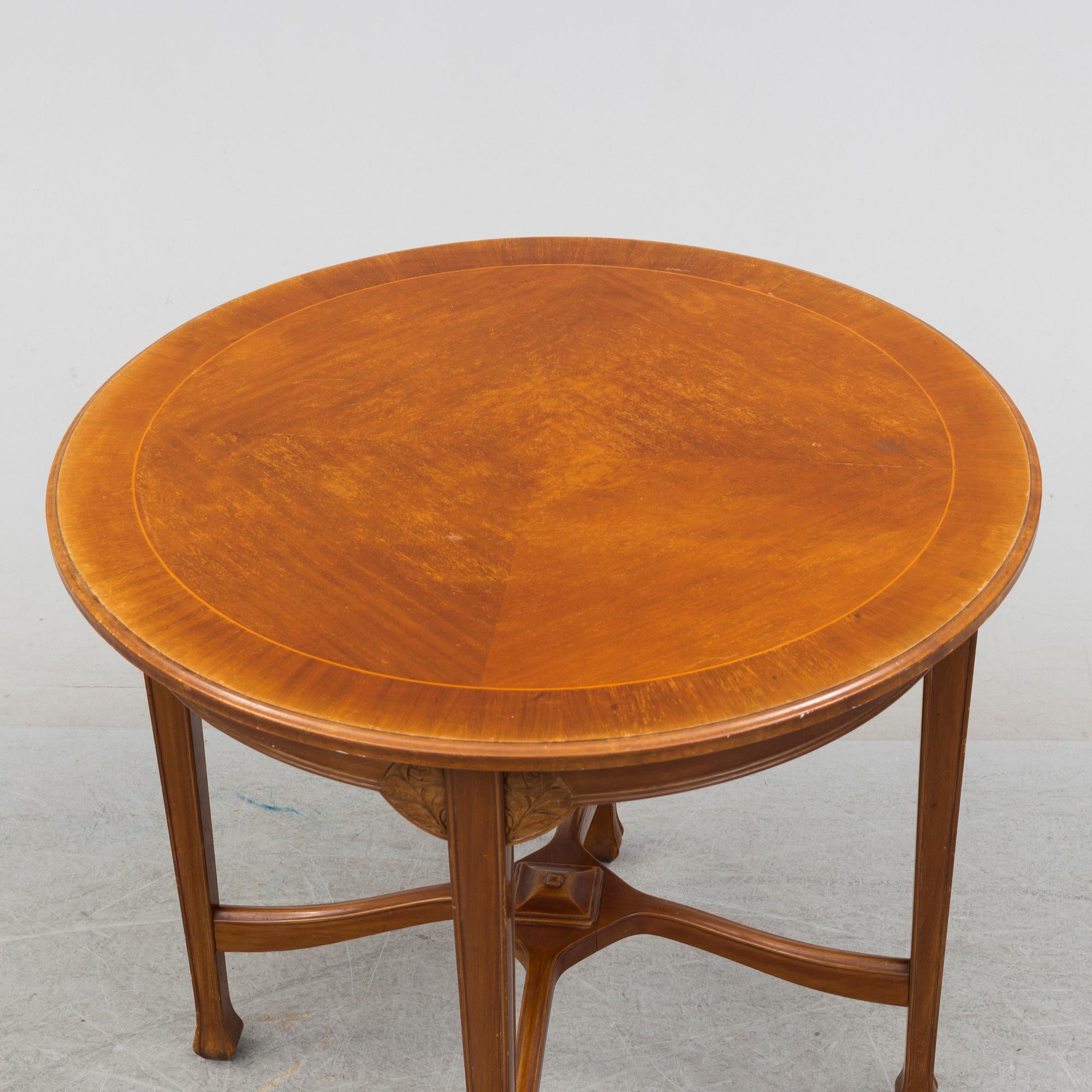 An early 20th century art nouveau table.