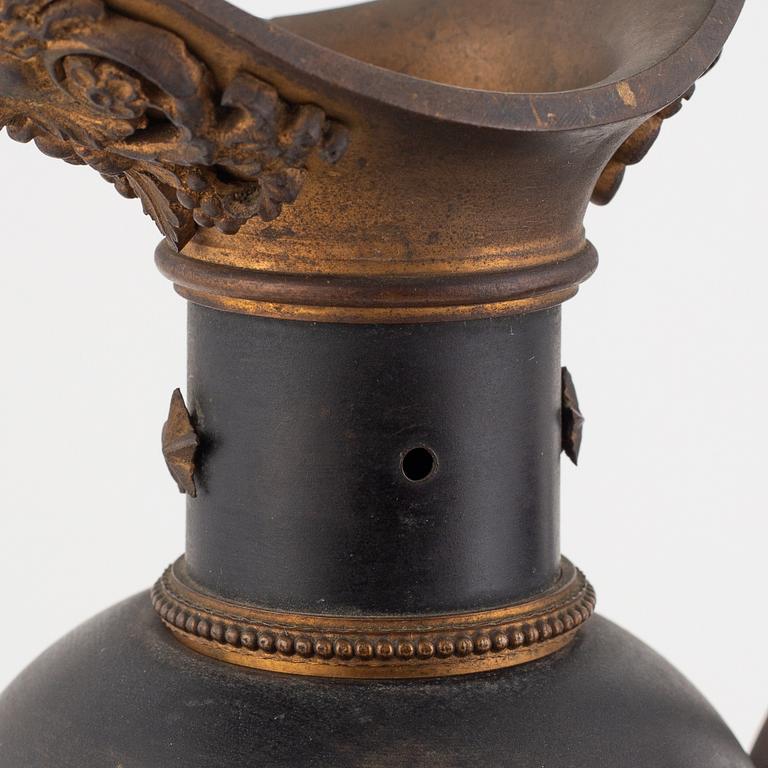 A pair of empire style decoration urns, 19th century.