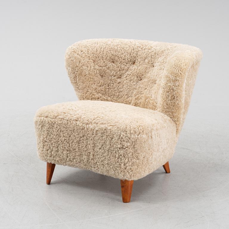 A Swedish Modern easy chair, 1940's/50's, the model has been sold via Gösta Jonsson.