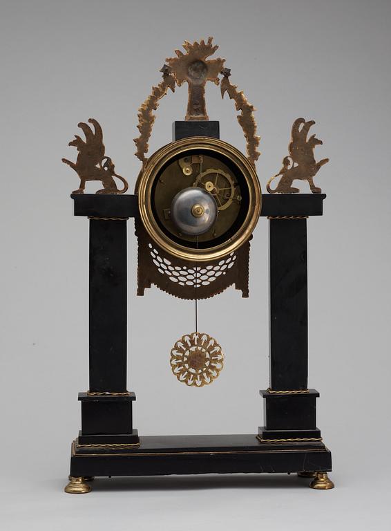 A French Louis XVI late 18th century gilt bronze and marble mantel clock.