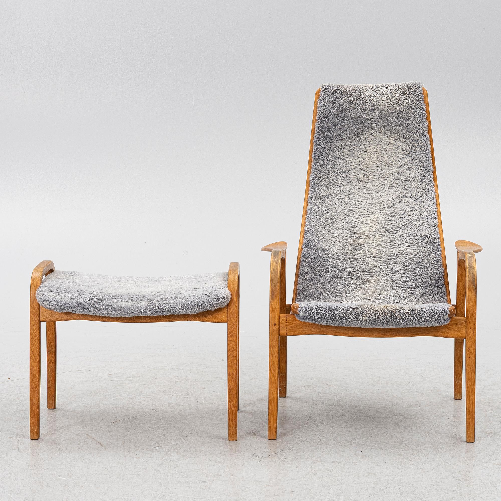 Yngve Ekström, a 'Lamino' armchair with ottoman and sidetable, Swedese, Sweden, 21st century.