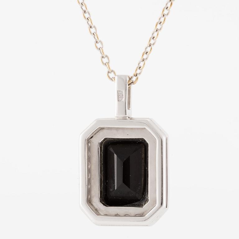 Pendant in 18K white gold set with brilliant-cut diamonds and likely onyx, with chain.