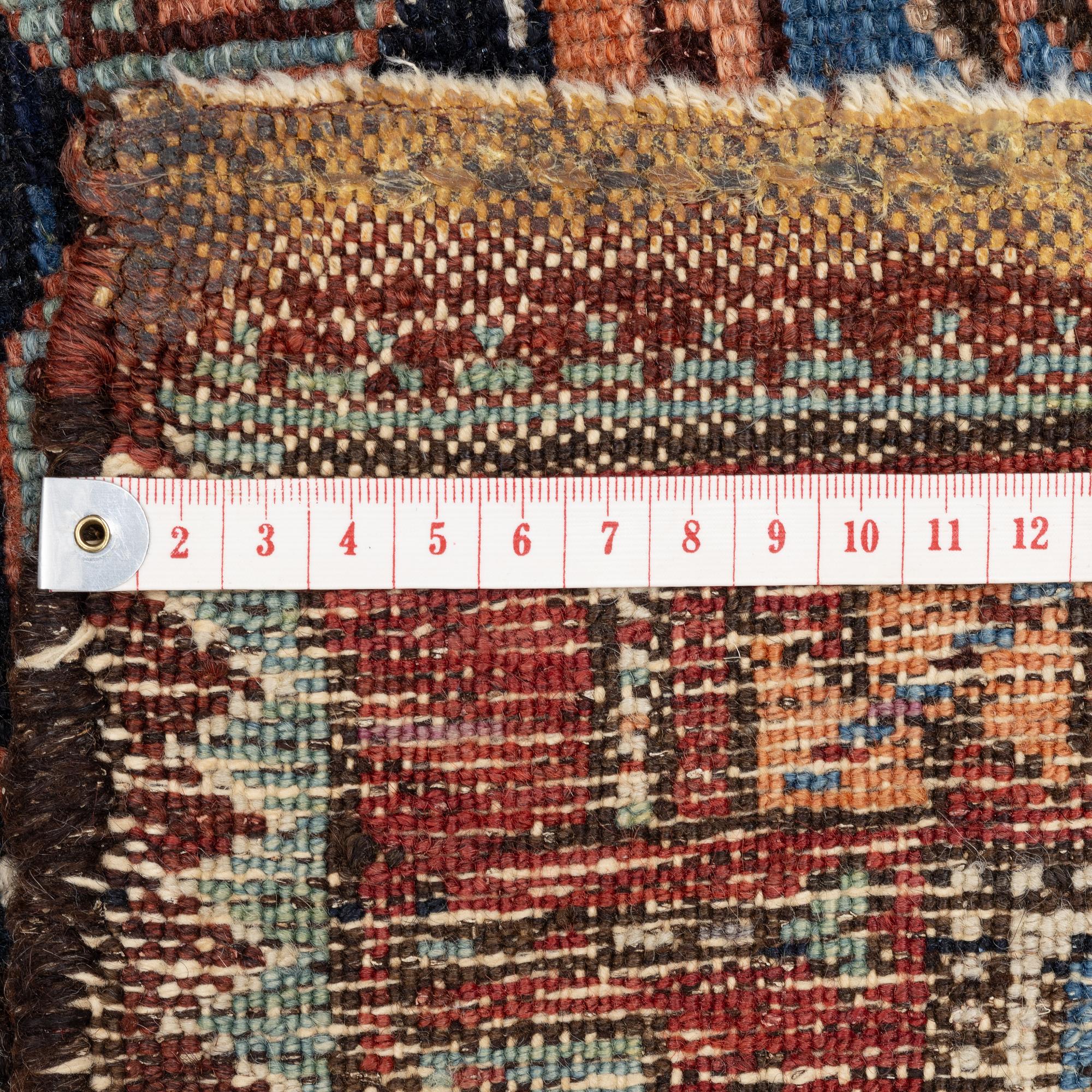 A Northwest Persian antique rug, c. 166 x 106 cm.