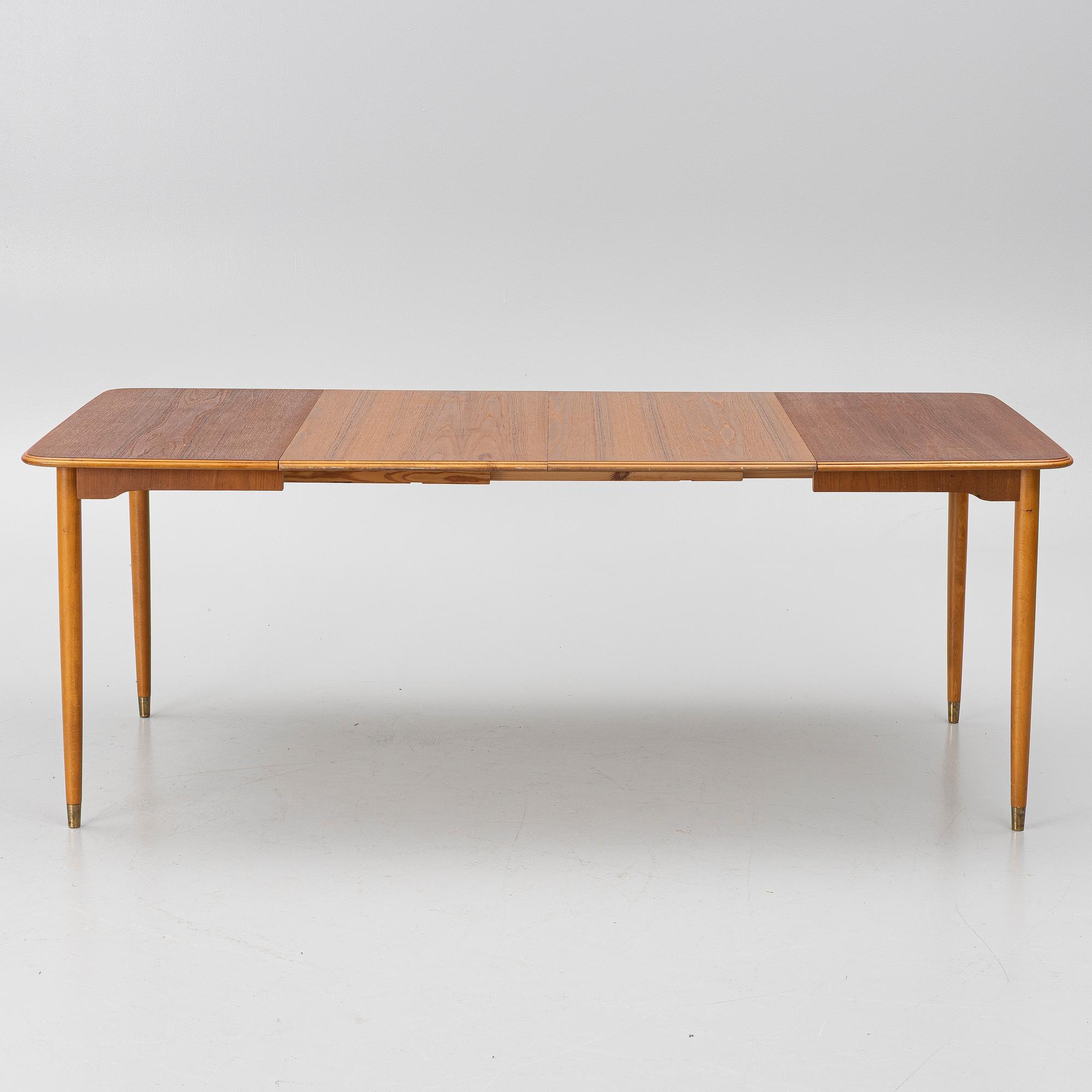 A dining table, teak, 1960s.
