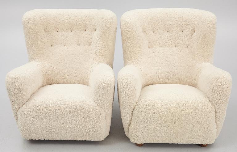 A pair of Danish Modern sheepskin armchairs, 1930's/40's.